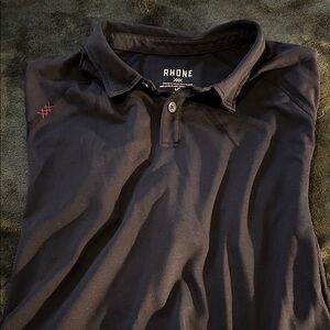 Rhone Men's Dark Polo Shirt with Red Stitch